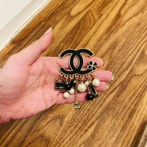 Chanel brooches